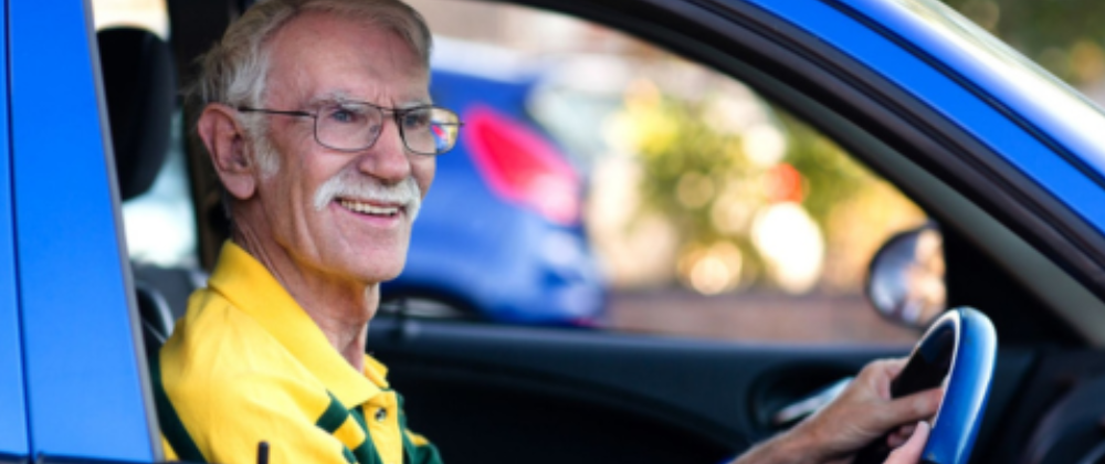 Volunteer driver smiling