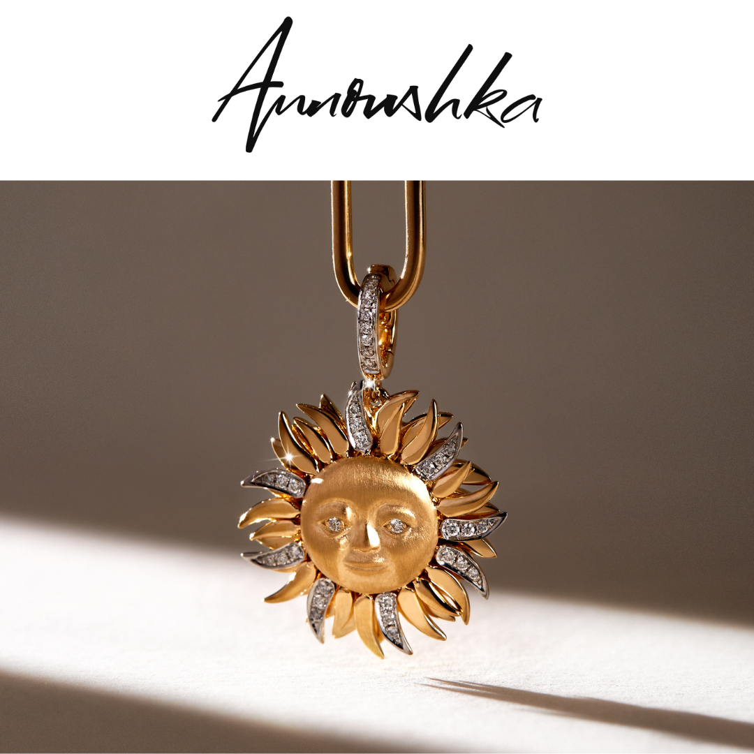 Image of black logo  with gold jewellery - Annoushka