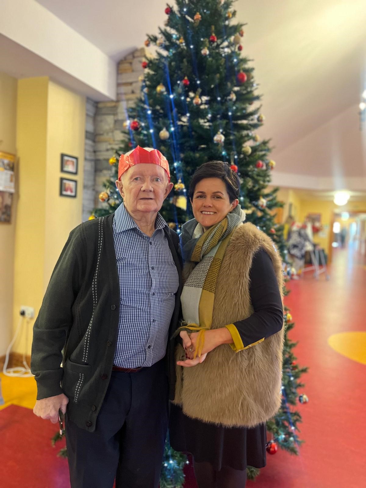 Martin and Grainne infront of Christmas Tree